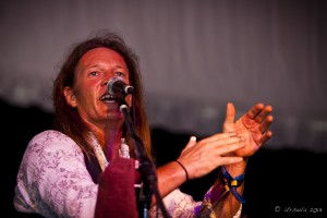 Portrait: Chris Eaton of Round Mountain Girls singing and clapping, Bluesfest 2013