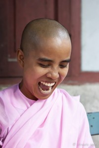 Portrait of a laughing burmese nun, Sagaing Hill