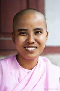Portrait of a smiling burmese nun, Sagaing Hill