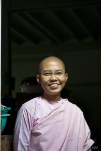 Portrait of a smiling burmese nun, Sagaing Hill