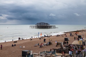 The ruins of Brighton's West Pier sit against threatening black clouds, Brighton Beach, Great Britain