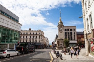 View up a Brighton street to the clock tower, West Sussex, UK
