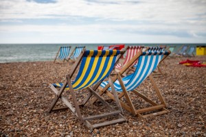 Empty striped beach chairs, Brighton Beach, UK