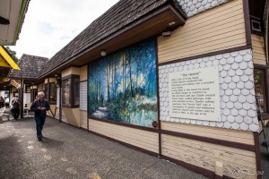 Laneway in Chemainus, BC, with the story of, and a mural depicting, The Hermit
