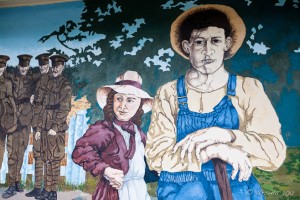 Mural: Man and woman in farm clothing, Chemainus BC