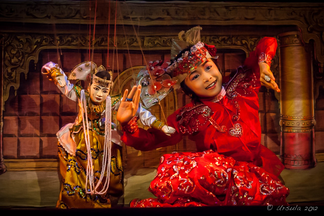 Burmese wooden marionette dancing with a child - Mandalay Marionettes Theatre.