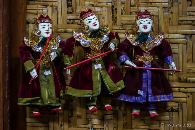 Marionettes for Sale against bambee matting, Mandalay Marionette Theatre