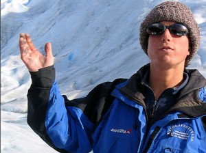 Handsom argentinian male in jacket and wool hat and jacket, Perito Moreno glacier.
