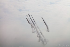Trailing decorative plumes of smoke, the RSAF Black Knights, Singapore Airshow 2014