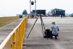 Photographer with a tripod on the Changi Exhibition Centre Pavement, Singapore Airshow 2014