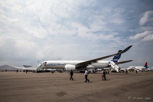 People looking at a stationary Boeing A350 Airbus, Singapore Airshow 2014