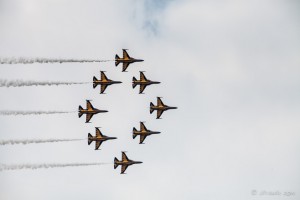 Eight gold and black supersonic T-50s in tight diamond formation, Singapore Airshow 2014
