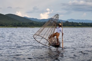 Leg Rowing Fishermen with a woven fish net, Inle Lake