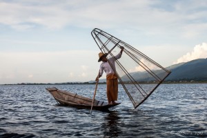 Leg Rowing Fishermen with a woven fish net, Inle Lake