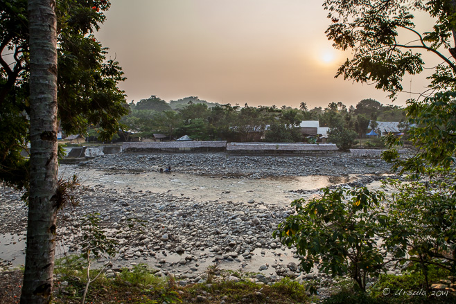 Sun through a volcanic ash haze on the Bahorok River