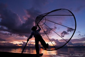Intha Leg Rowing Fisherman, Purple sunset, Inle Lake, Myanmar