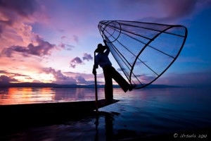 Intha Leg Rowing Fisherman, inky sunset, Inle Lake, Myanmar
