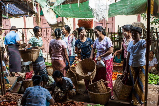 Burmese women with woven baskets in the market, Shwezigon Pagoda