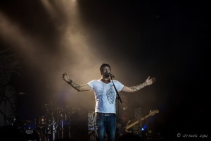 Michael Franti on stage at Byron Bay Bluesfest 2014.