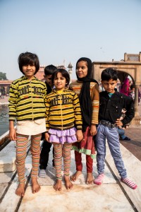 Indian children posing around the Reflecting Pond, Jama Masjid, Old Delhi