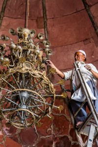 A man changing the lights, Jama Masjid, Old Delhi
