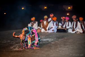 Gypsy woman performing a Backbend, Manvar Desert Camp, Dechu, India