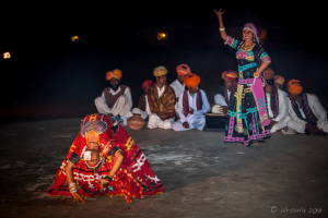 Gypsy woman performing a Backbend, Manvar Desert Camp, Dechu, India