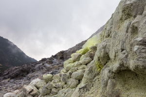 Rocks coated in crystalline sulfur, Mount Sibayak, North Sumatra, Indonesia