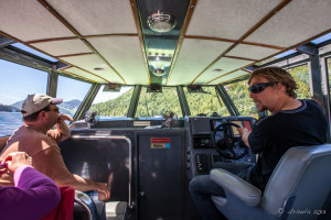 View of Clayoquot Sound waters from inside a motor boat, BC