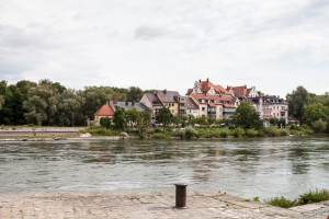 View across the Danube to colourful Regensburg Housing, Germany
