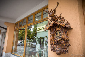 Ornately carved Wooden Bavarian Clock outside a shop, Regensburg DR