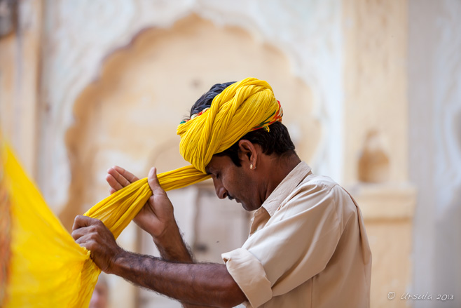 Rajasthani man tying a turban, Mehrangarh Fort, Jodhpur India
