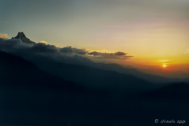 Fish Tail Mountain Annapurna, clouds and sun rise, Nepal