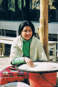 A young woman sorting rice, Banthanti, the Annapurnas, Nepal