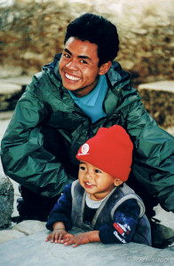 Nepalese man and child, the Annapurnas, Nepal
