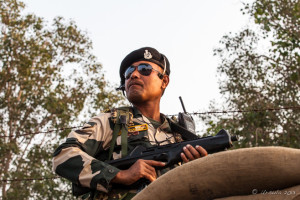 Indian Border Guard in beret and sunglasses