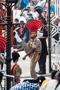 Indian BSF soldier high-kicking at the gate, Attari-Wagah Border, Amritsar Punjab India