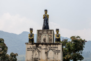 Monument with three men on it, Samosir Island, North Sumatra