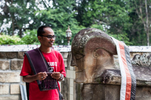 A Batak Guide at the King Sidabutar's Tomb, , Samosir Island, North Sumatra