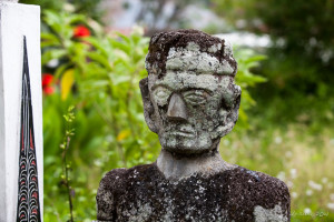 Carving of a man at Makam Raja Sidabutar, Samosir Island, North Sumatra