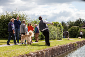 People on the shore, Tiverton Canal, Devon UK