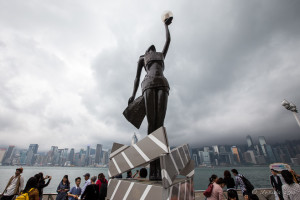 Hong Kong Film Awards statue against a cloudy sky, Avenue of Stars, TSM Hong Kong