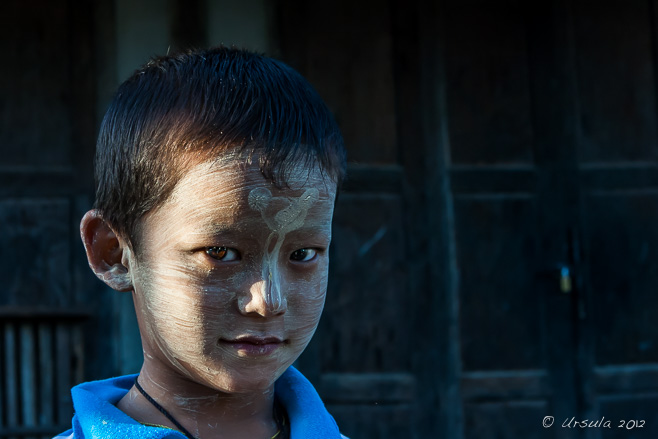Burmese boy in Thanaka Powder, Nyaung Shwe Market, Myanmar