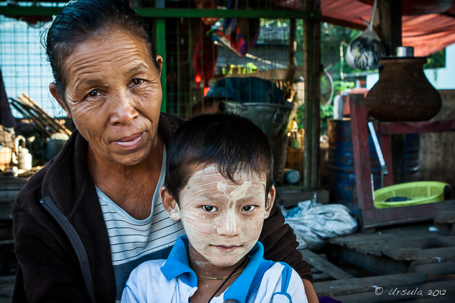 Burmese woman and her grandson, Nyaung Shwe Market, Myanmar