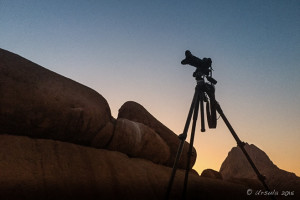 Silhouette of a camera on a tripod, Spitzkoppe, Namib Desert, Namibia