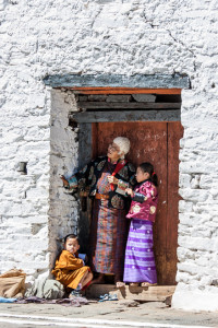 Old woman and two children, Wangduephodrang Dzongkhag Dzong, Central Bhutan.