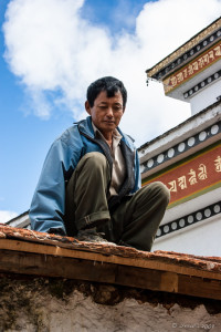 Bhutanese Tradesman on the Roof, Dochu La Chorten, Bhutan