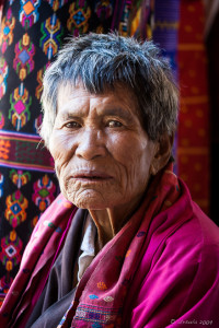 Old Bhutanese Woman in Pink, Wangduephodrang Dzongkhag Dzong, Central Bhutan.