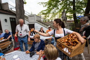 Bavarian woman handing out pretzels, Schneider Brewery, Kelheim