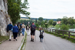 Walking tour group leaving Weltenburg Abbey, Bavaria